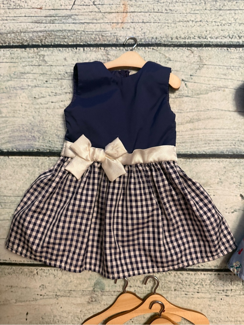 2 American girl doll dresses and 10 wood doll hangers. - Picture 5 of 10